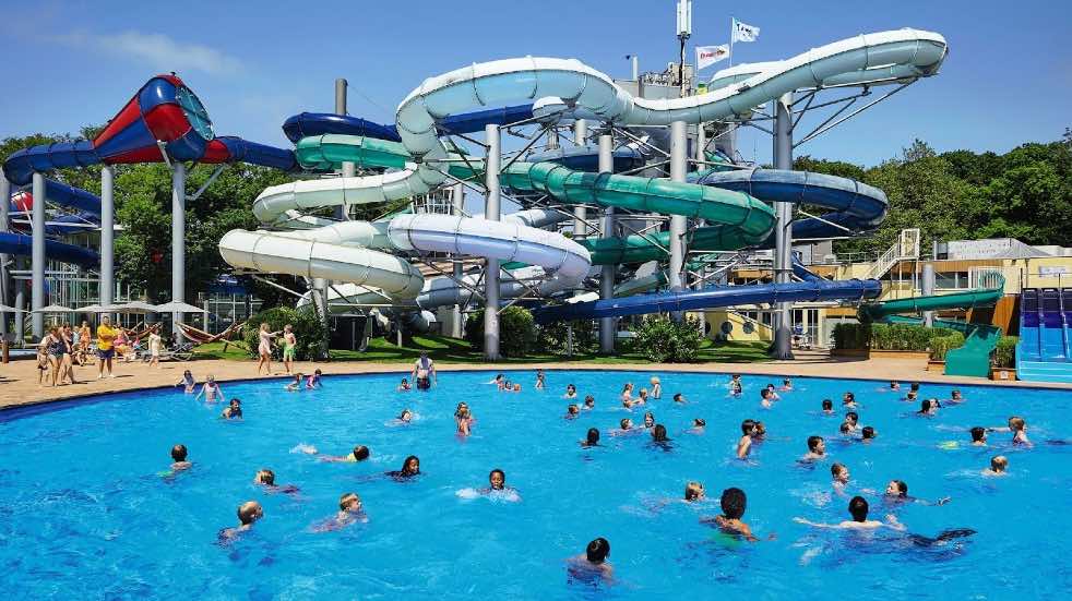 Swimming pool with slides